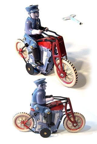 Postman on Motorcycle Tin Toy