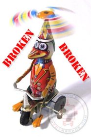 Duck on Bike Tin Toy Windup