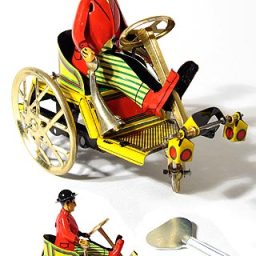 Man on Trick Cart